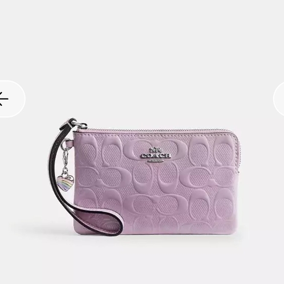 Coach Handbags - Coach Lavender Embossed Wristlet
